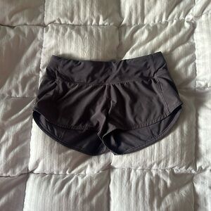 Lululemon speed up shorts 2.5 inch in a plum color: size 2